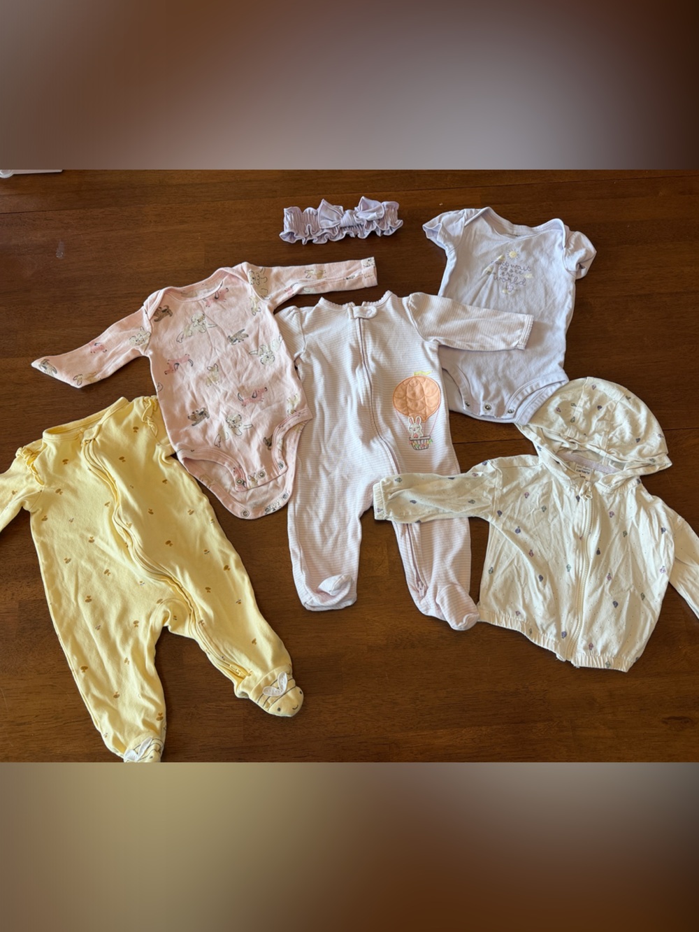 Carter's Baby Girl Mixed One-Piece Sets - Purple, Yellow, and Pink.